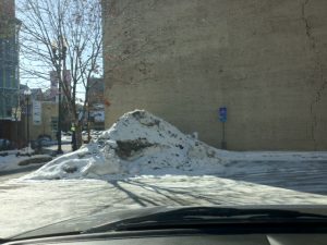  Pile of snow left in the disability parking area