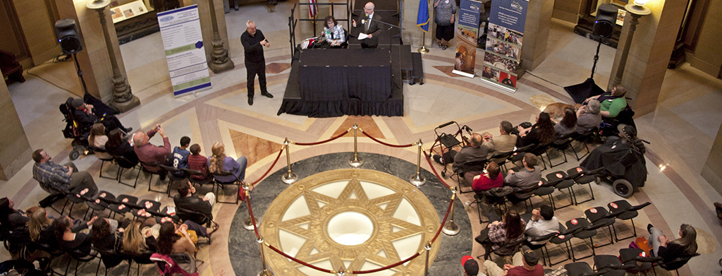 People with disabilities gathered at the Minnesota State Capitol Rotunda