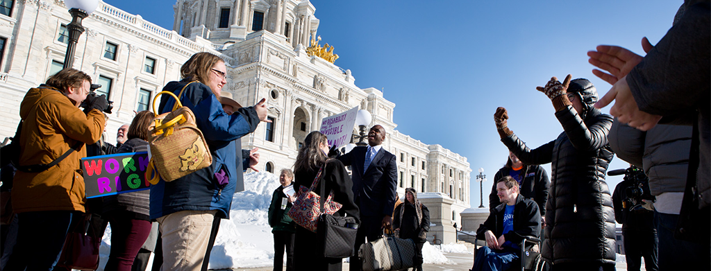 People gathered in front of the Minnesota State Capitol