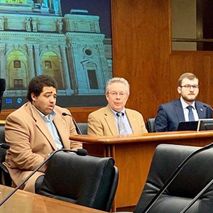 Disability Rights Activists testify on digital accessibility in a hearing room at the MN Capitol