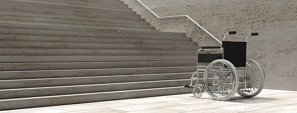 Wheelchair in front of a flight of steps