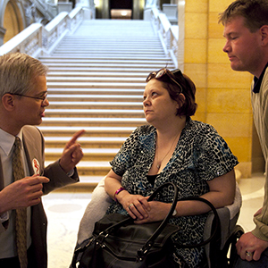Disability advocates speak with Senator John Marty.