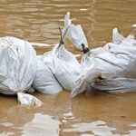 Sandbags in the middle of a flooded street