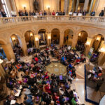 Disability advocates gather in the Capitol Rotunda