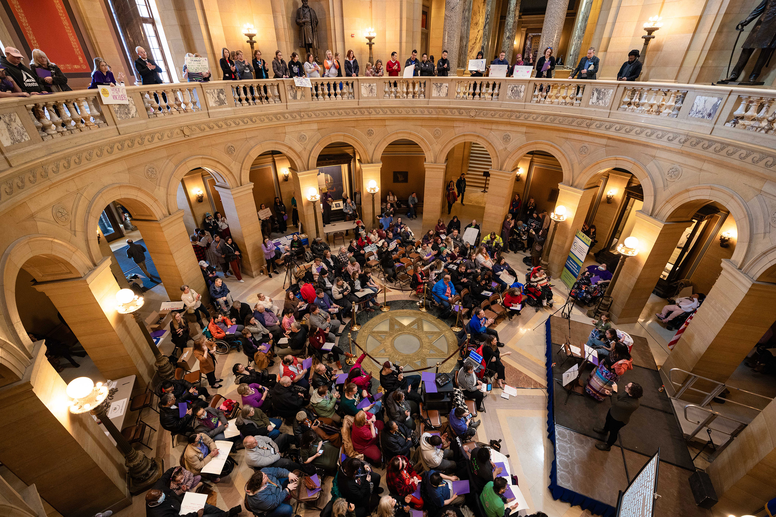 Disability advocates gather in the Capitol Rotunda