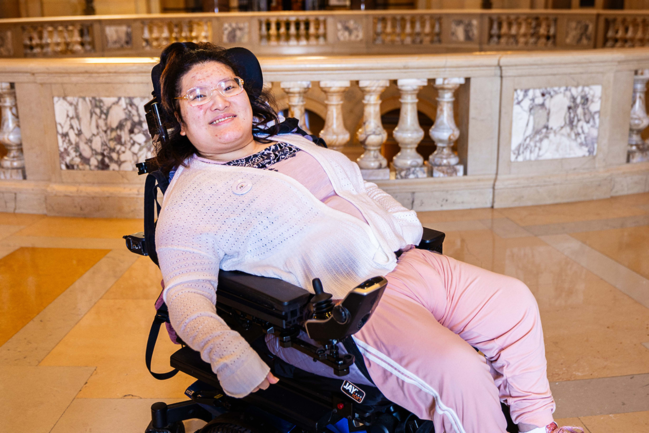 Mao Yang in her wheelchair on the second floor of the Capitol Rotunda